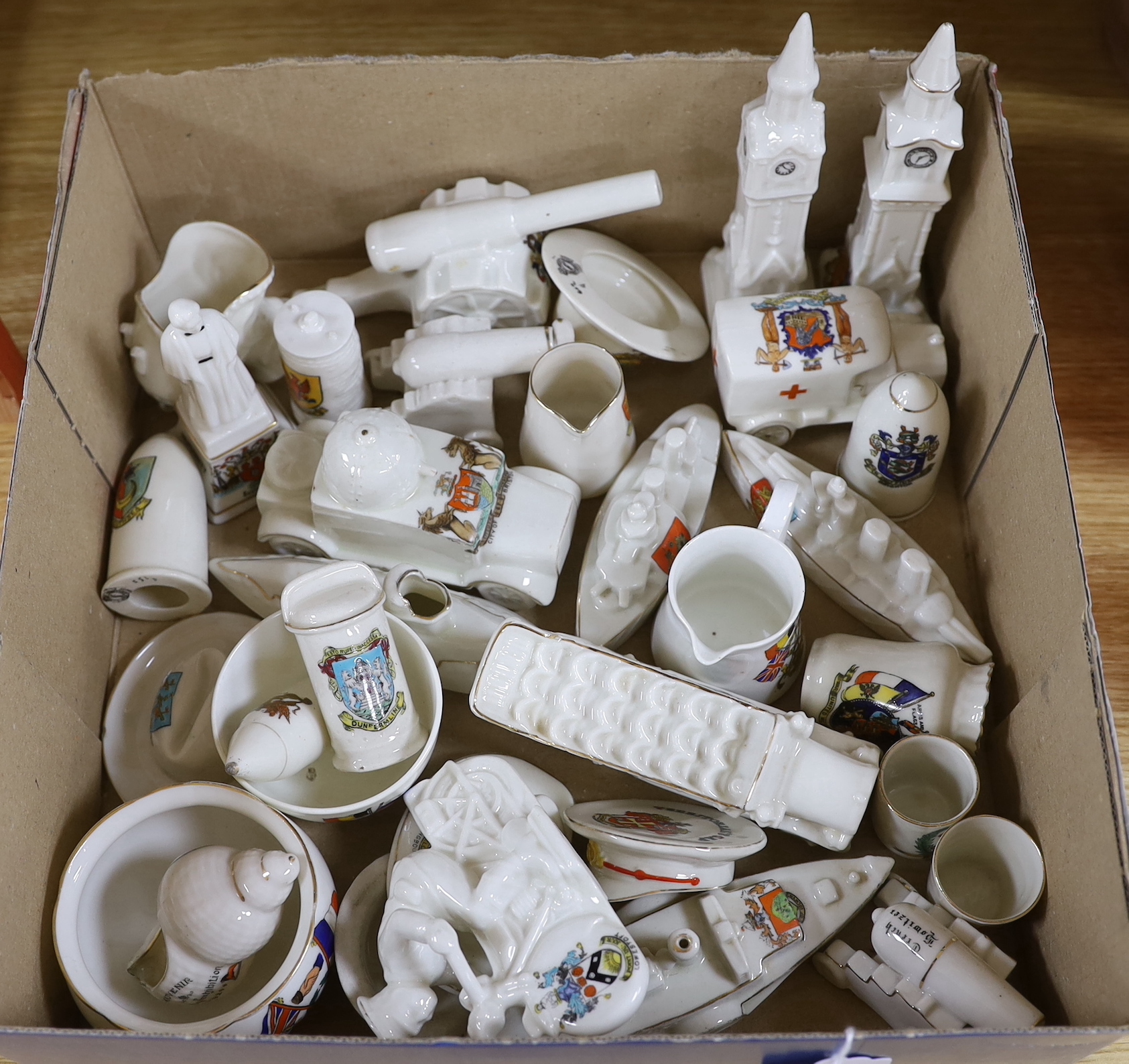 A collection of heraldic miniature crested china including W H Goss and Swan, the largest each 16.5cm high